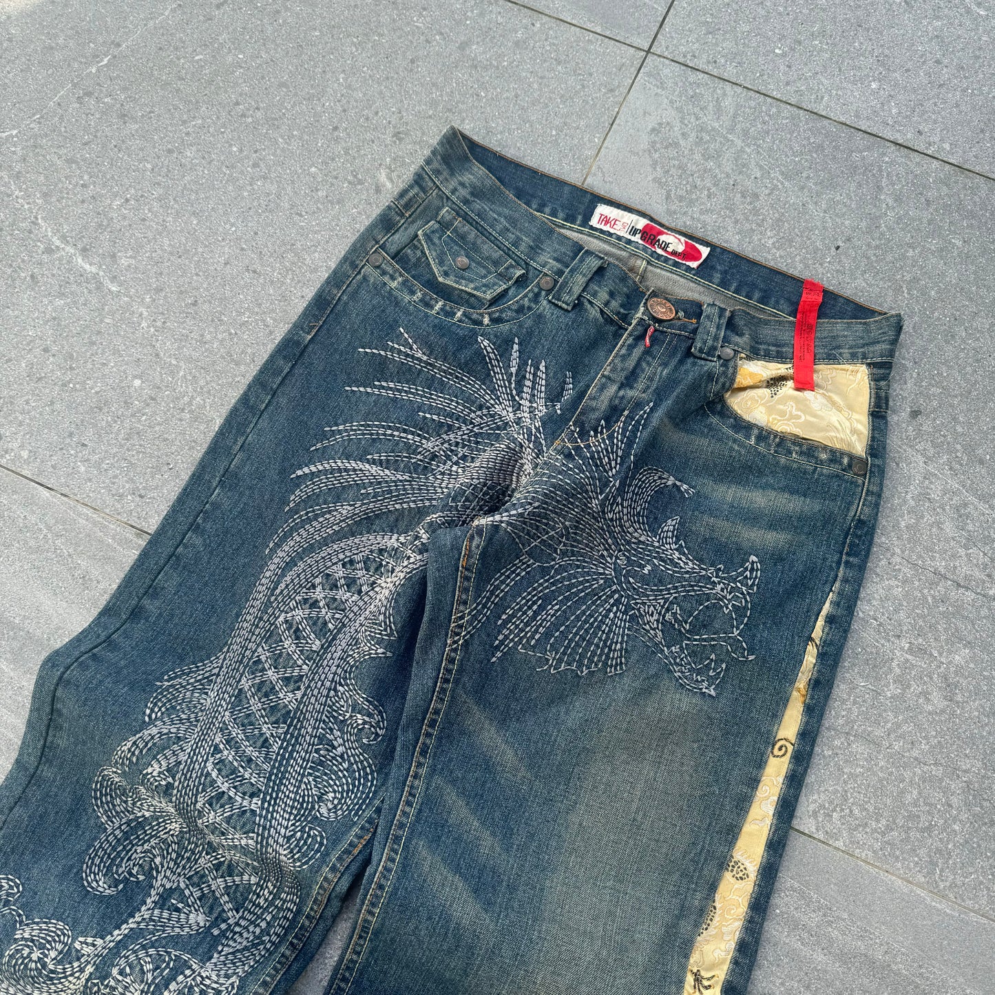 these jeans are art. take2 dragon jeans - 35x33”