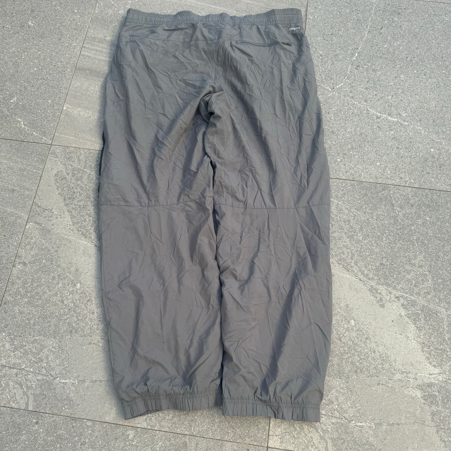 side hit nikes - 38x32”