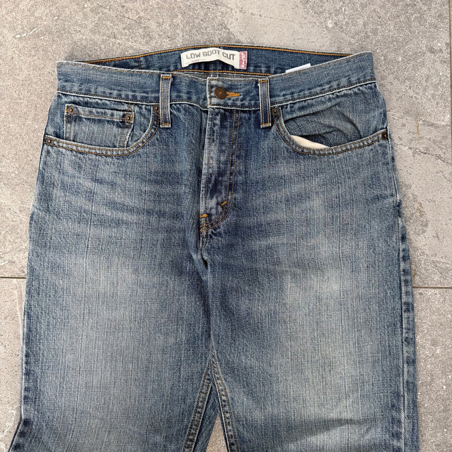 i love this colour. 527 levi’s low bootcuts - 31x31”