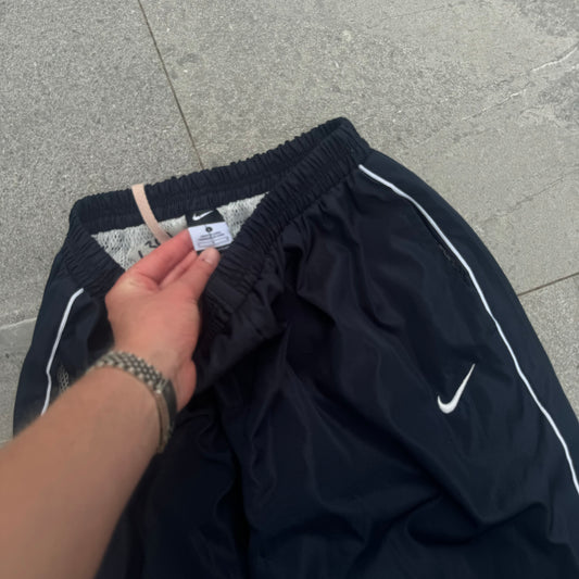 nike track pants - L (36”)