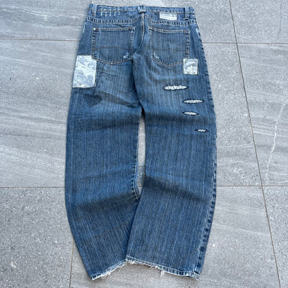 gah damn these r sick. patchwork billabong jeans - 34x32”