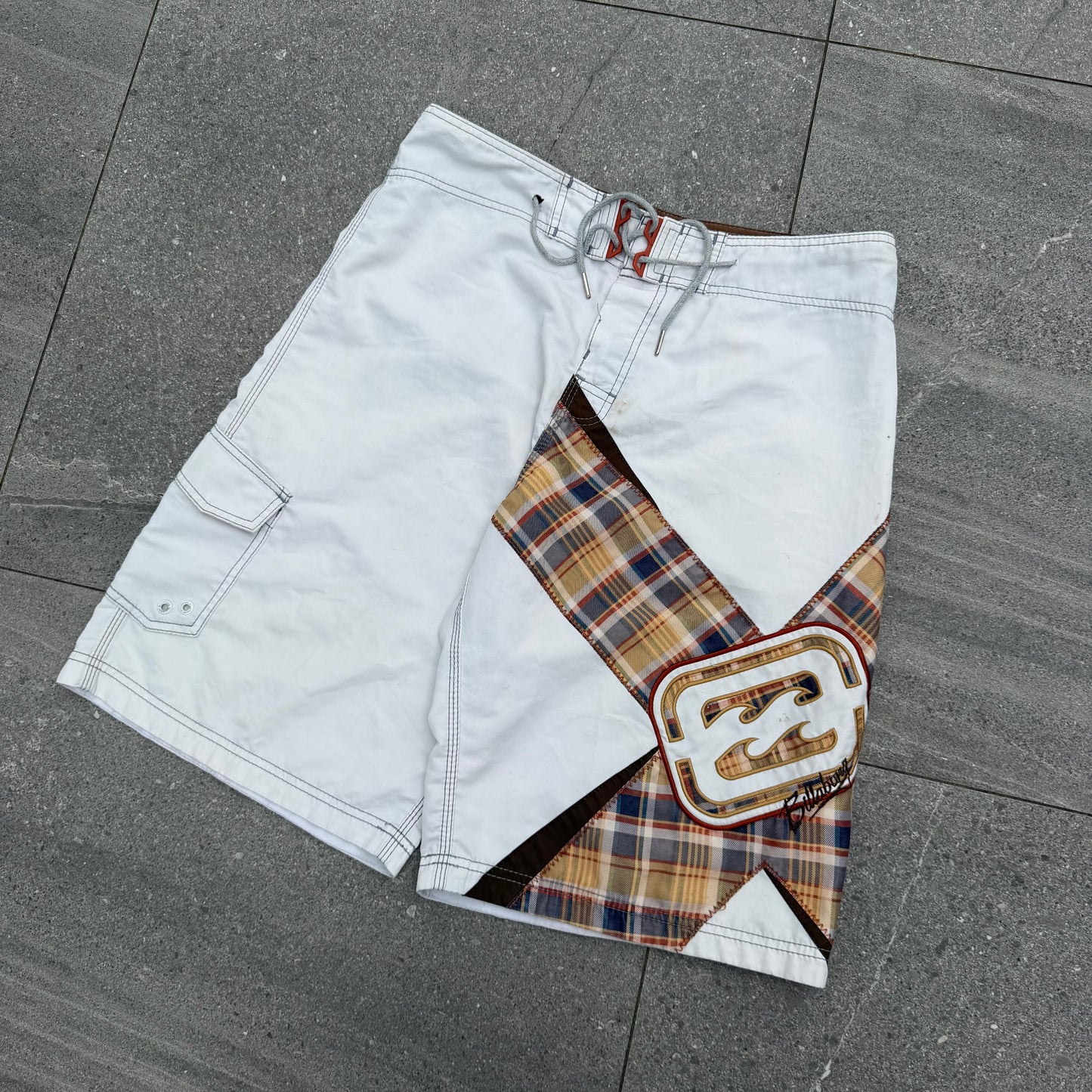 the grail pair of shane dorian billabong boardies. size 34”