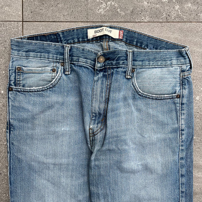 goated levi 527 bootcut fades - 34x30”