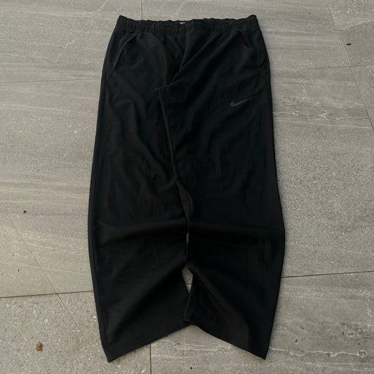 blacked out nike trackpant - 36”