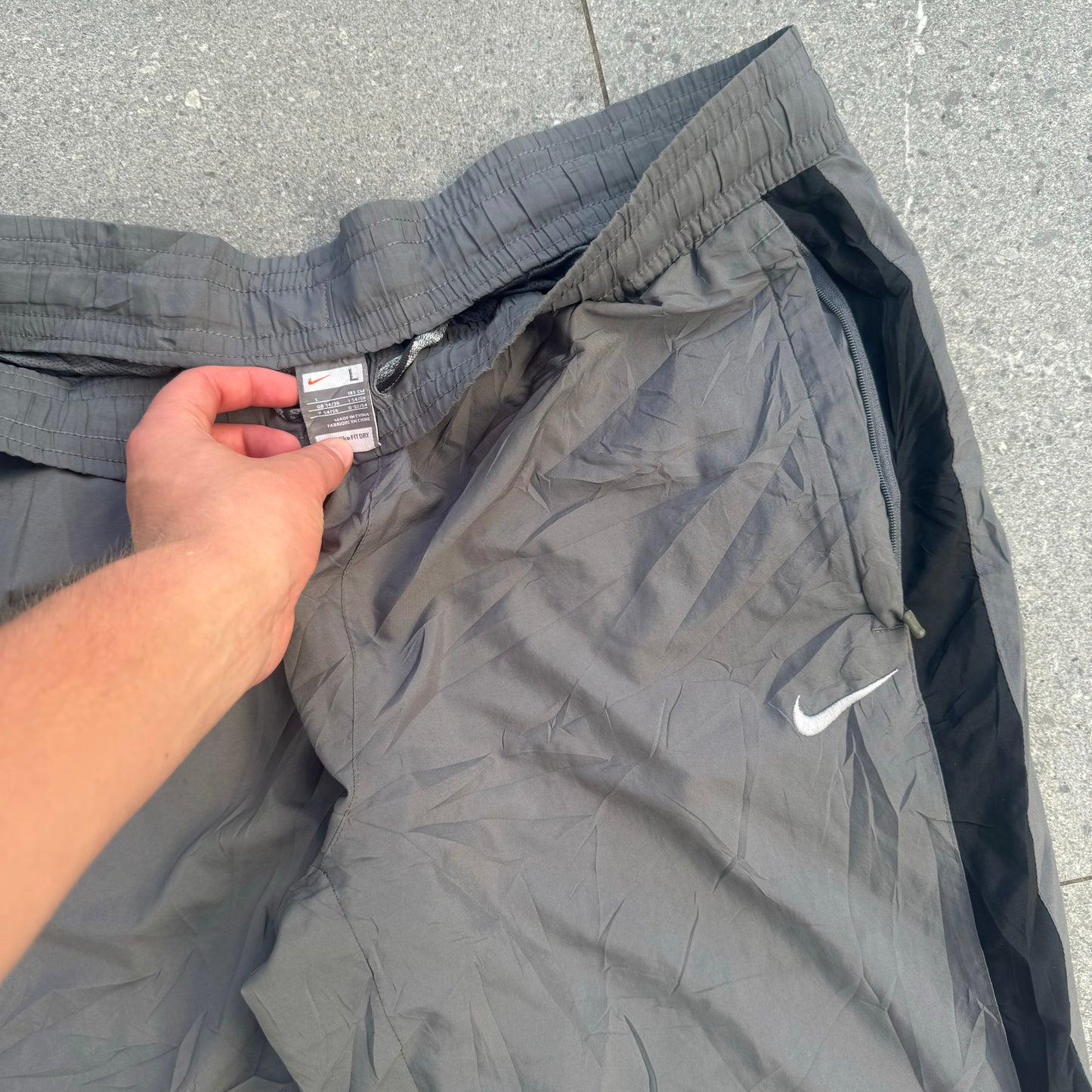 side hit nikes - 38x32”