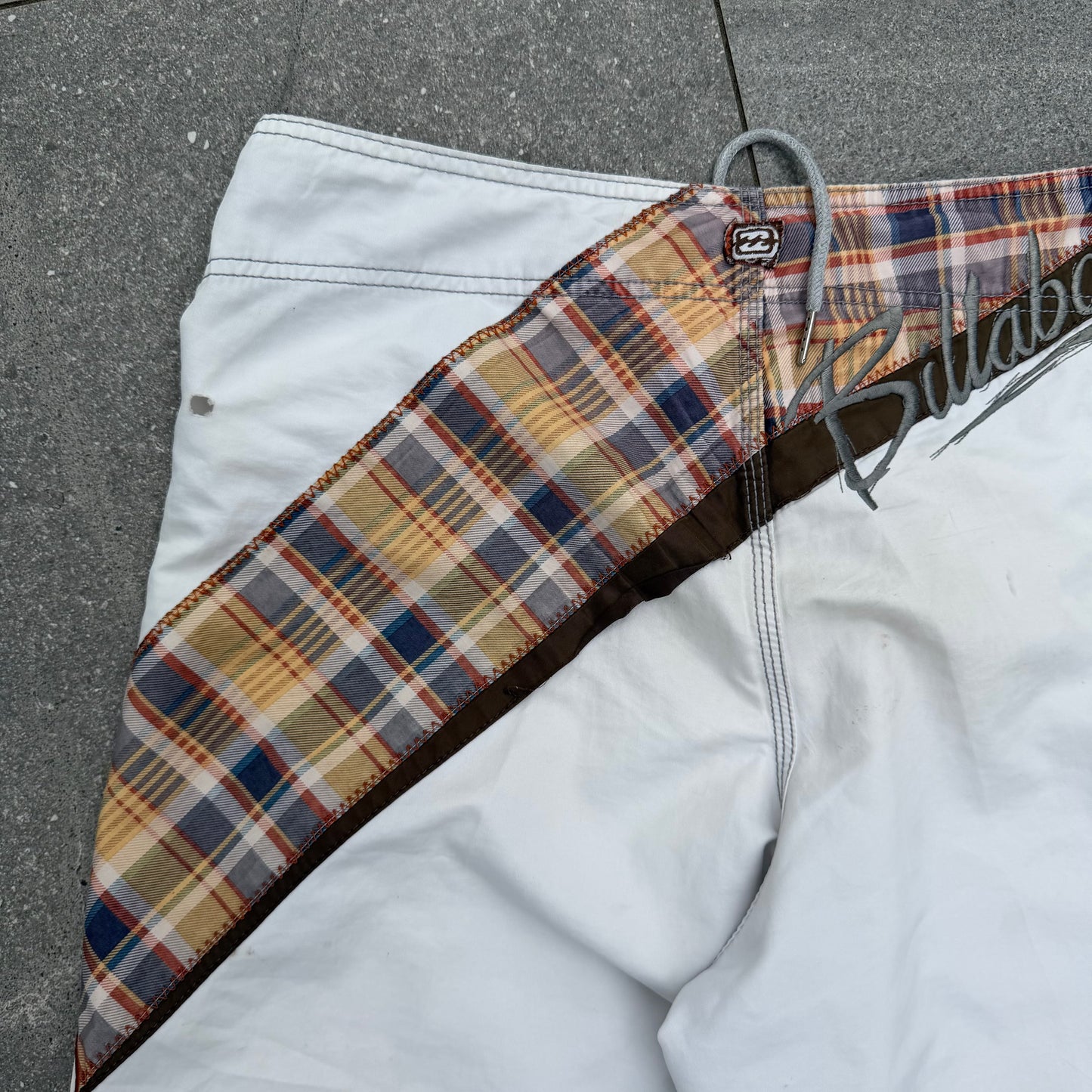 the grail pair of shane dorian billabong boardies. size 34”