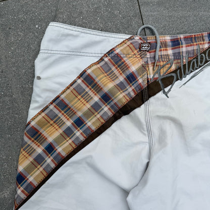 the grail pair of shane dorian billabong boardies. size 34”
