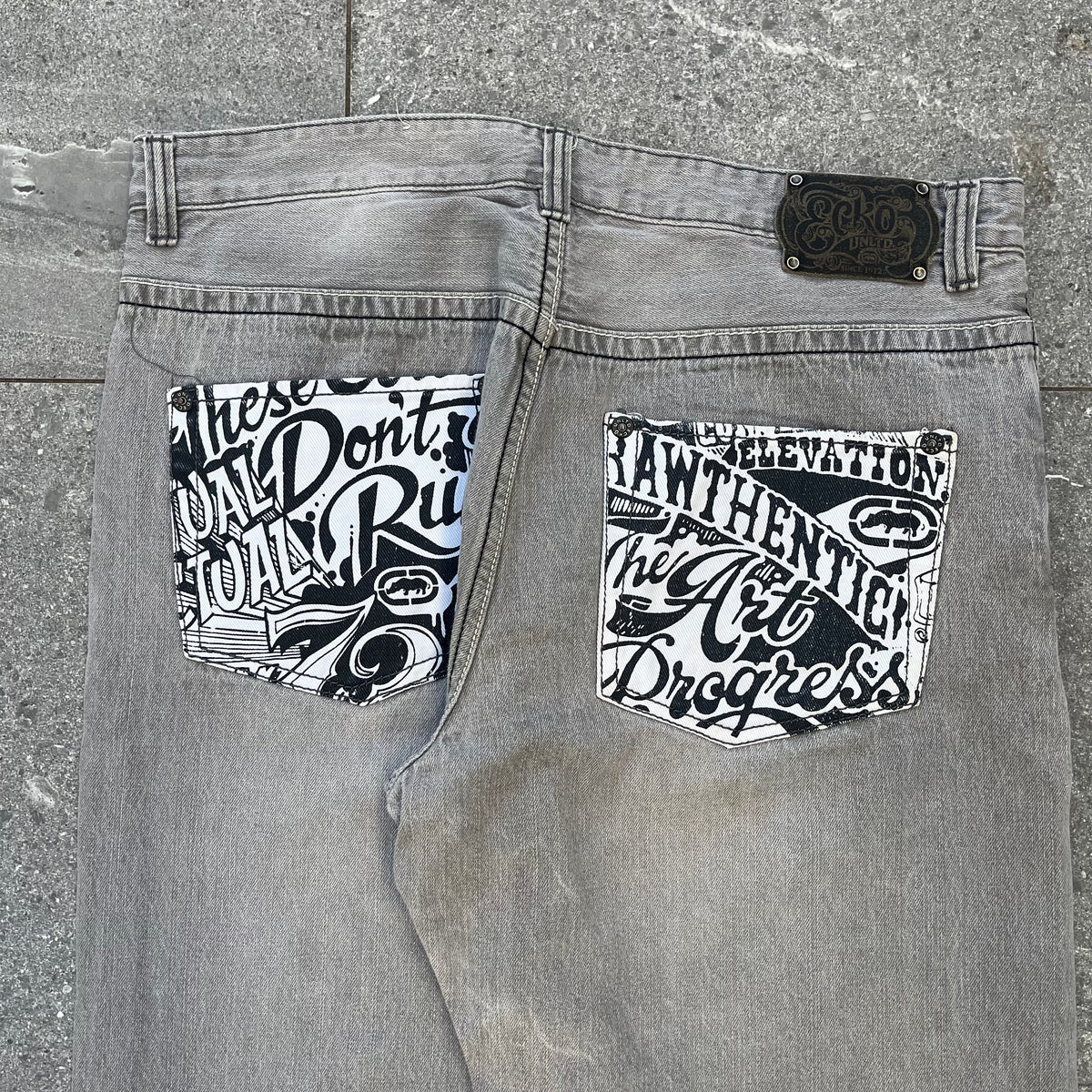 damn. ecko pocket hits - 38x31”