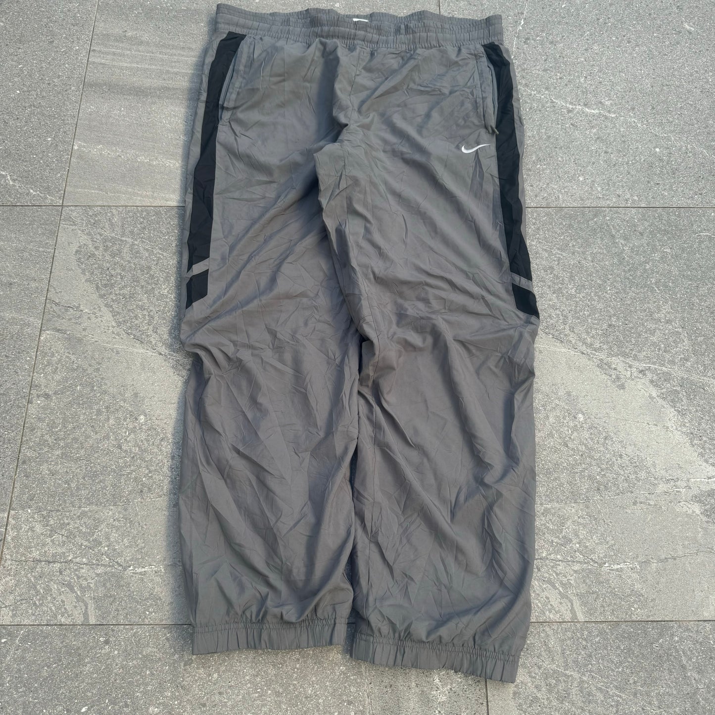 side hit nikes - 38x32”