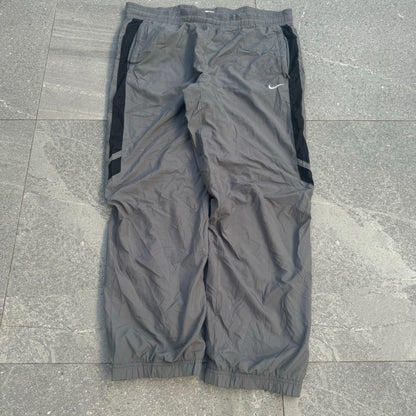 side hit nikes - 38x32”