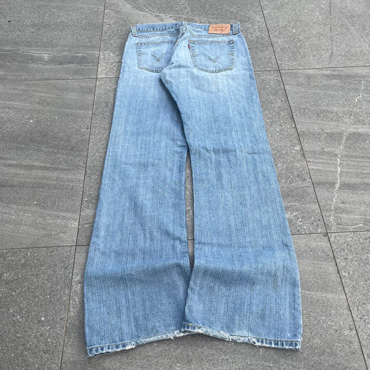 faded levi low rise bootcuts - 32x34”