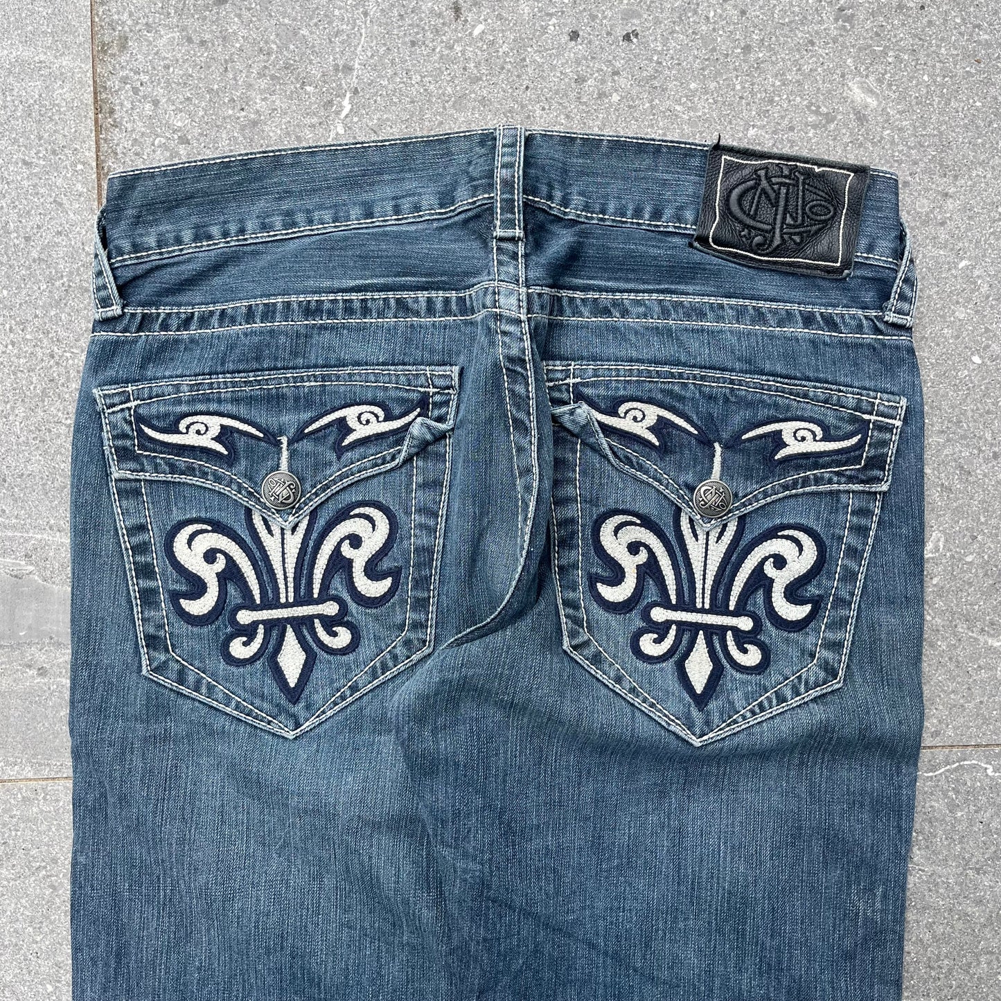 fleur de lis bootcuts - 34x33”