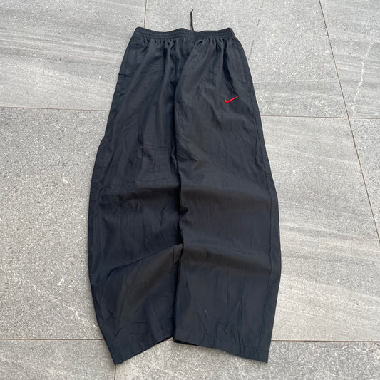 red swoosh nike trackpants - 32”