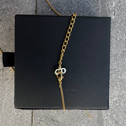 gold plated dior shell necklace