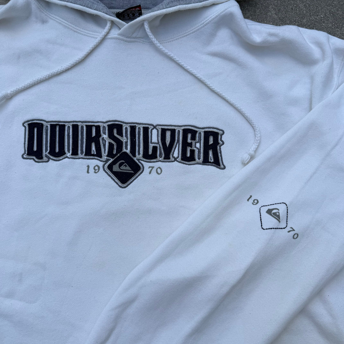 flawless quiksilver felt spellout - L