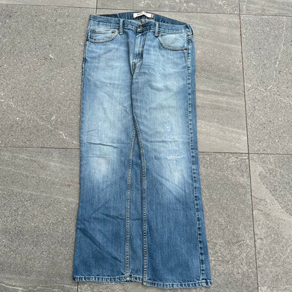 goated levi 527 bootcut fades - 34x30”