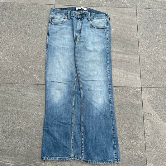 goated levi 527 bootcut fades - 34x30”