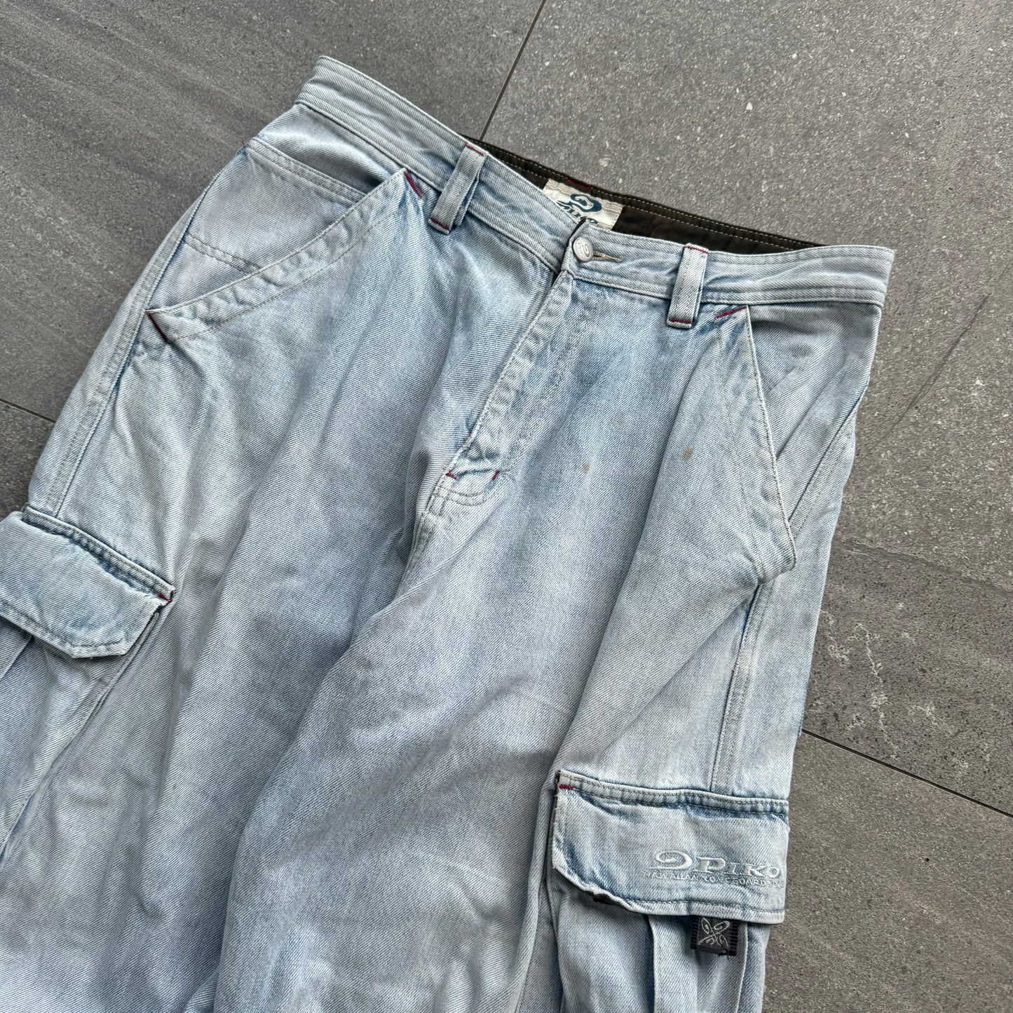 goated lightwash pikos - 33x31”