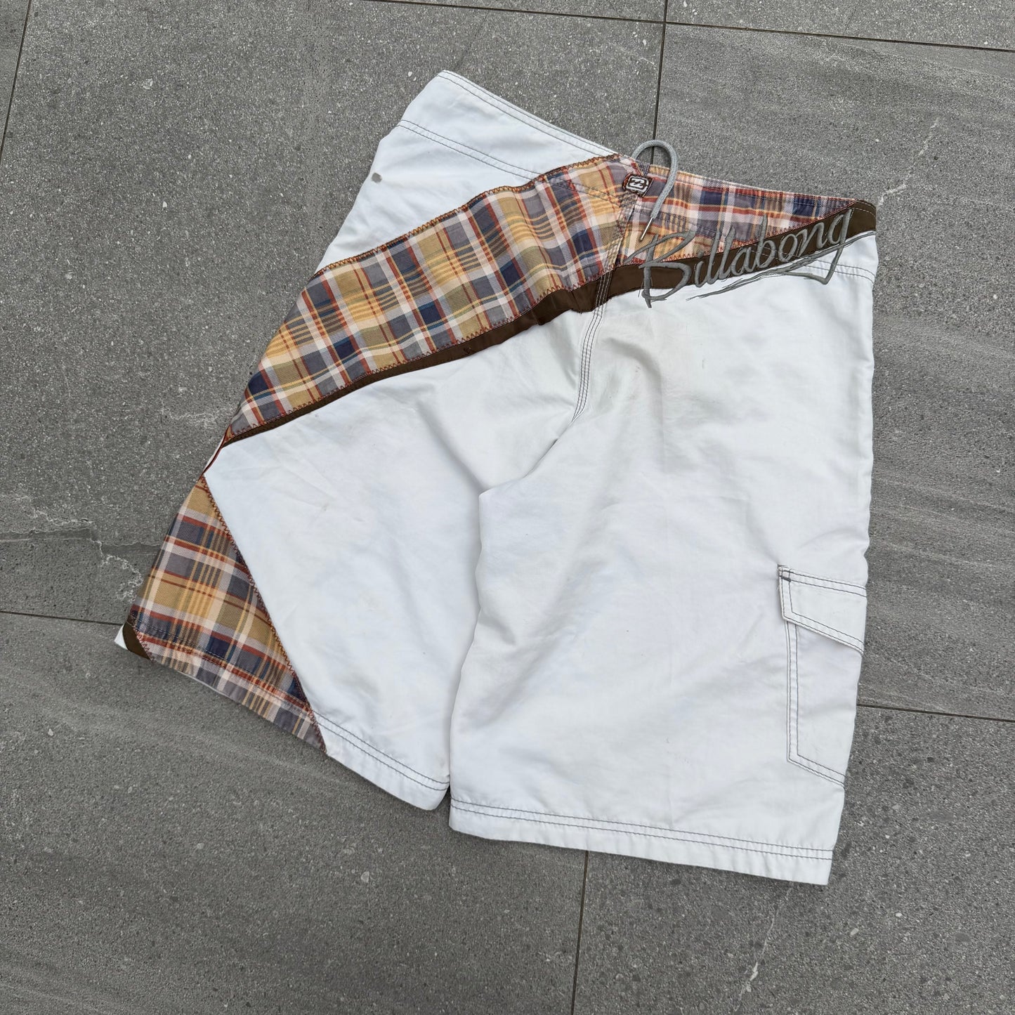 the grail pair of shane dorian billabong boardies. size 34”