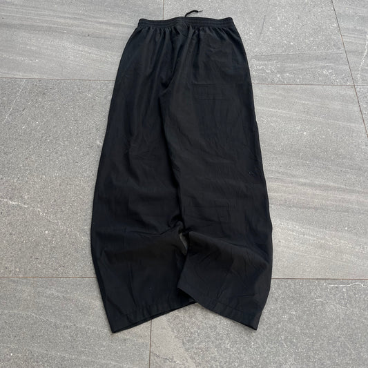 red swoosh nike trackpants - 32”