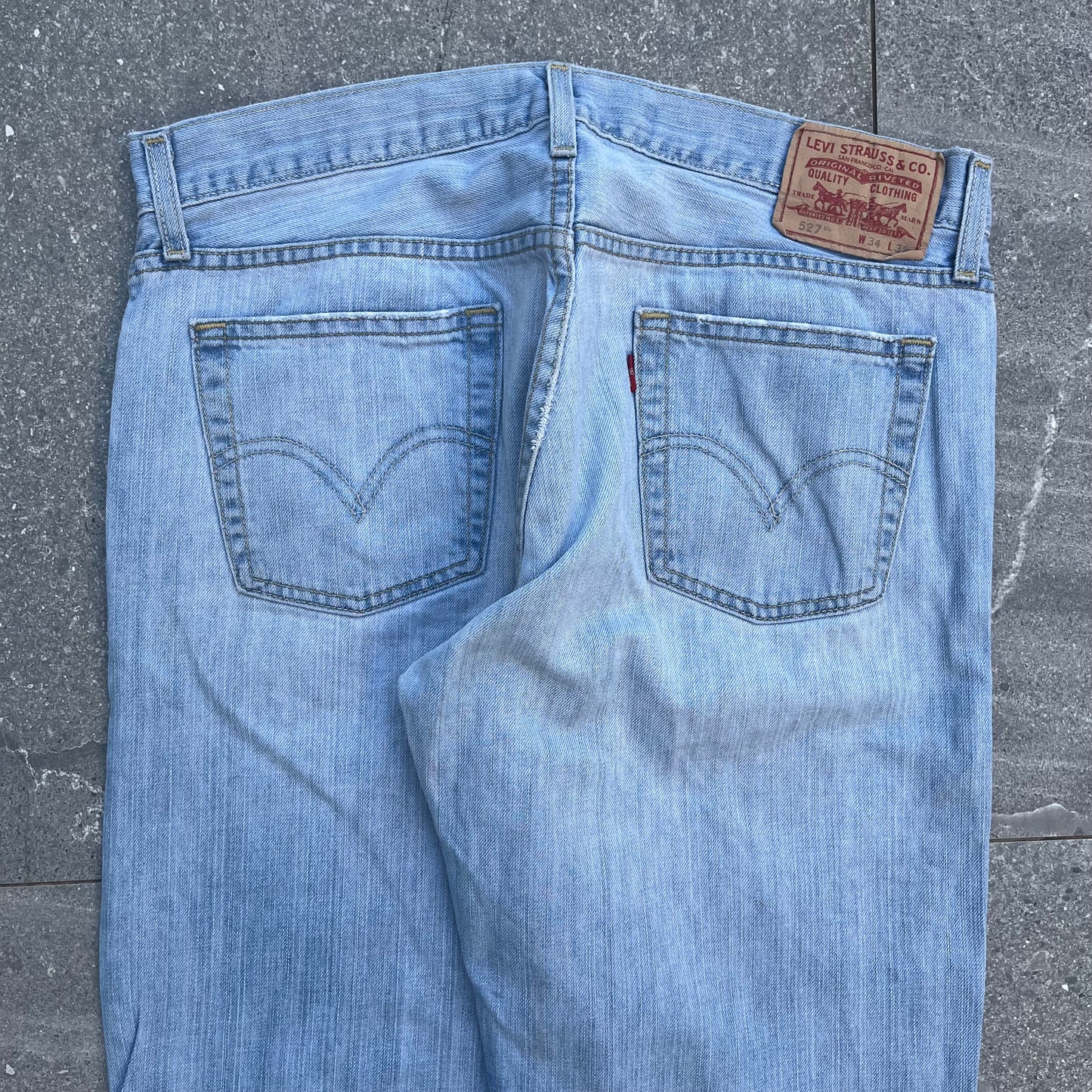 goat status lightwash levi 527 low bootcuts - 36x34”