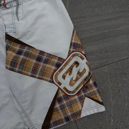 the grail pair of shane dorian billabong boardies. size 34”
